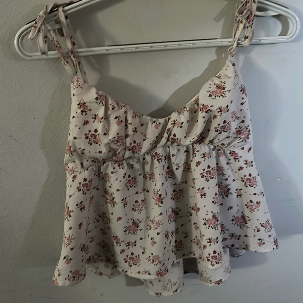 Beautiful floral loose fitting shirt for a girl younger than 25!